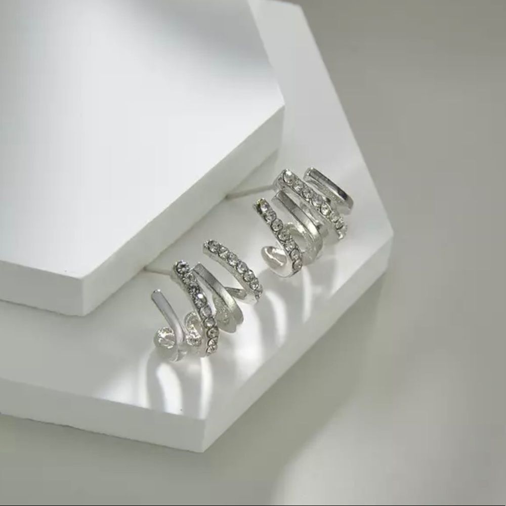 ‎4 CLAW SILVERTONE EARRINGS